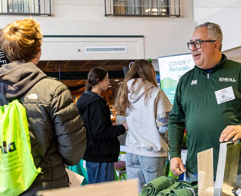 youth at vendor booth at the green industry winter forum