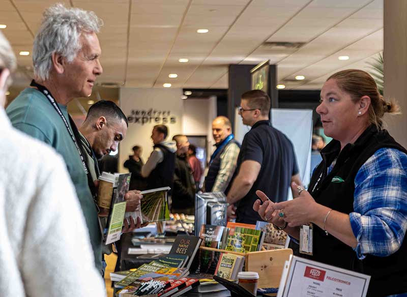 green industry winter forum vendors talking with attendees